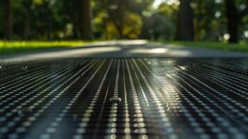 Closeup of a solar roadway panel showcasing its sleek design and compact size photo