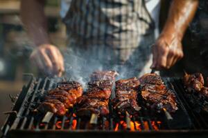 Man Grilling Meat on a Barbecue photo