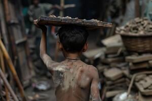 A Child Laborer from the Back View photo