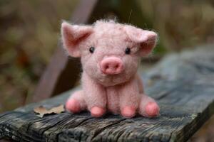 Charming Felt Pig Sitting with a Cute Expression photo