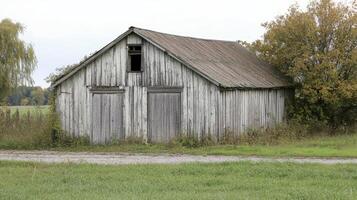 Aging wooden building set for demolition, showing signs of wear. photo
