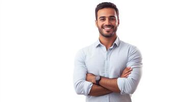 A cheerful Indian businessman in casual clothes standing proudly. photo