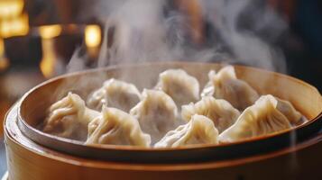 Bamboo Basket Filled with Steaming Chinese Dumplings photo