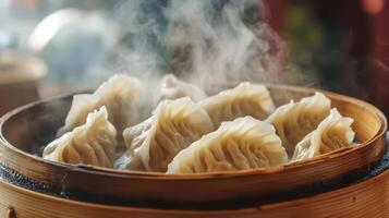 Steaming Chinese Dumplings in a Bamboo Steamer Basket photo