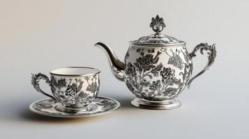 Vintage Silver Tea Set with Ornate Floral Patterns photo