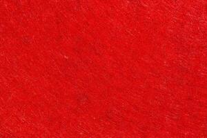 Red felt texture with copy space, fabric background photo