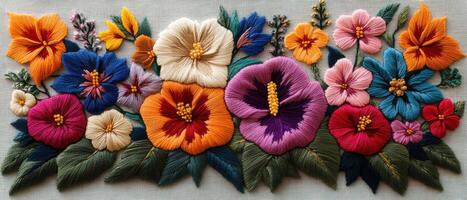 Colorful Embroidered Floral Design with Vibrant Flowers and Green Leaves on Fabric Background photo