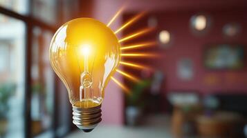 Illuminated Light Bulb in Modern Interior Setting with Warm Ambient Lighting and Blurred Background photo