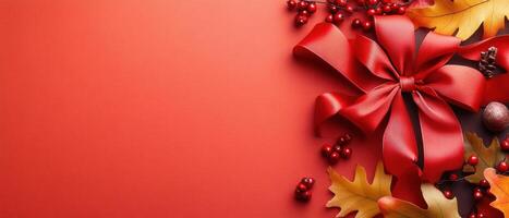 Festive Red Ribbon and Autumn Leaves on Red Background for Holiday Celebrations and Seasonal Decorations photo