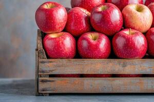 Fresh Red Apples in Rustic Wooden Crate for Long-Term Storage and Preservation of Fruits photo