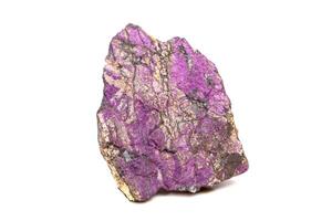 Macro mineral stone purpureus, purple purpurite in the breed a white background photo