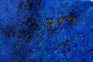 Macro Azurite mineral stone with Pyrite inserts on a white background photo