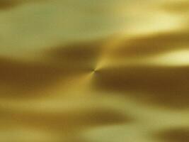 Metal texture background in gold photo