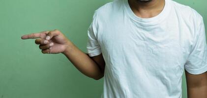 young male's hand keeping forefingers horizontally while showing letter P on sign language photo