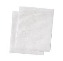 Top view of two pieces of folded white tissue paper or napkin paper in stack isolated on white background with clipping path photo