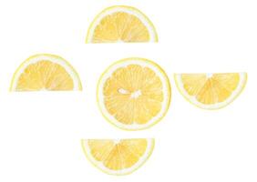 Top view set of fresh yellow lemon in halves and slices isolated on white background with clipping path photo