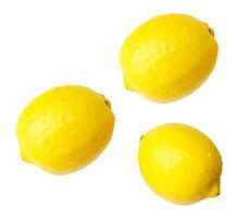 Top view set of three fresh ripe yellow lemon fruits isolated on white background with clipping path photo