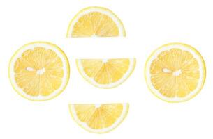 Top view set of fresh yellow lemon in halves and slices isolated on white background with clipping path photo