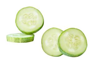 Front view set of fresh green cucumber slices in circle shape in stack isolated on white background with clipping path photo