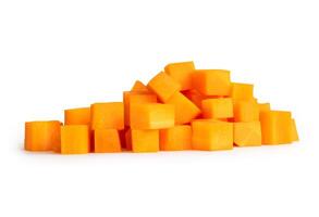 Front view of fresh orange carrot in cube shape in stack isolated on white background with clipping path photo
