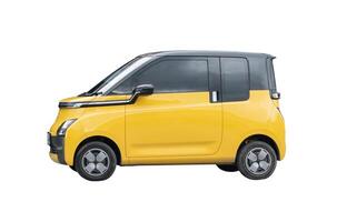 Side view of mini or small yellow electric car isolated on white background with clipping path photo