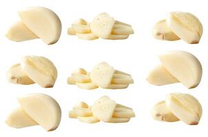 Side view set of fresh peeled white garlic cloves with slices in stack isolated on white background with clipping path photo