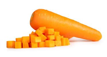 Side view of fresh orange carrot with slices in cube shape isolated on white background with clipping path photo