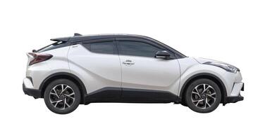Side view of white hatchback car isolated on white background with clipping path photo