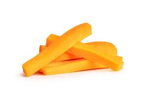 Side view of fresh orange carrot slices in stick shape in stack isolated on white background with clipping path photo