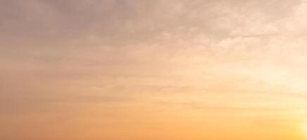 Beautiful morning or evening orange or red sky with clouds taken at the sea used as natural blackground texture photo