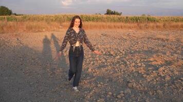 Strolling through a Dried Landscape at Golden Hour, basking in the warm, soft light video