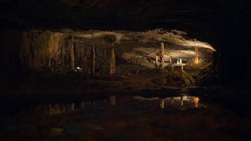 Illuminated Dark Rocky Stone Dripstone Caves Stalactite Background video