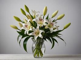 Arrangement of Elegant White Lilies in a Glass Vase against a Soft Gradient Background photo
