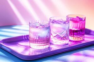 Three textured glass tumblers with cold drinks on a reflective purple tray, set within a transcendent purple to pink gradient ambiance. photo