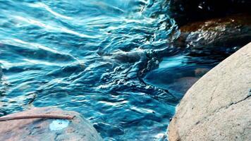 A clear flow of water near the stone video