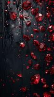 Red rubies on black backdrop. Symbols of luxury, wealth, prosperity. Abstract splashes of gemstones. photo