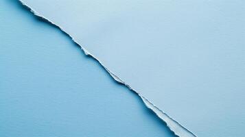 Close-up torn paper edge on blue background, high resolution, ideal for business presentations photo