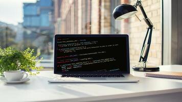Coding script text on screen code in bracket software. photo