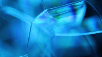 Blue bubbles in macro, connection of bubbles in macro, cell from liquid, molecules connection, water background video