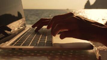 Hand Typing Laptop Computer Keyboard - Close-up Photo of a Hand Typing on a Laptop Keyboard in Low Light video