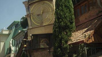 Group of tourists gathers in the square in front of the Tbilisi State Puppet Theater, watching the daily performances. Slow motion. video