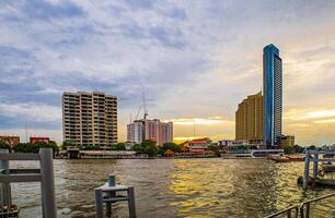 River featuring urban architecture and landmarks from places, Bangkok, Thailand. photo