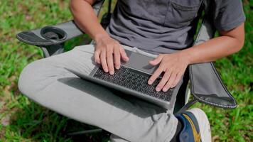 Close-up Typing on laptop keyboard. Programmer developing new software writing program code on a laptop. Work stress, anxiety, workplace think worry in job tough stress workforce issue. video