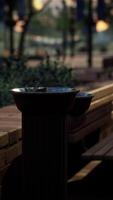 closeup of a drinking water fountain in a park on sunset video
