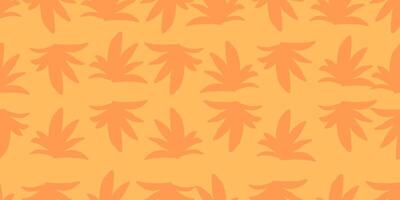 a pattern of leaves on an orange background vector