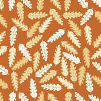 a pattern of leaves on an orange background vector