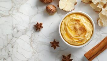 Cinnamon honey butter cream topping on white mug ceramic photo