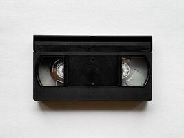 Vintage vhs cassette on plain background captures nostalgic retro technology photo