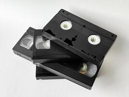 Retro vhs tapes on white background for nostalgic media themes photo