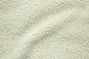 Wool plush fleece fur fabric texture background photo